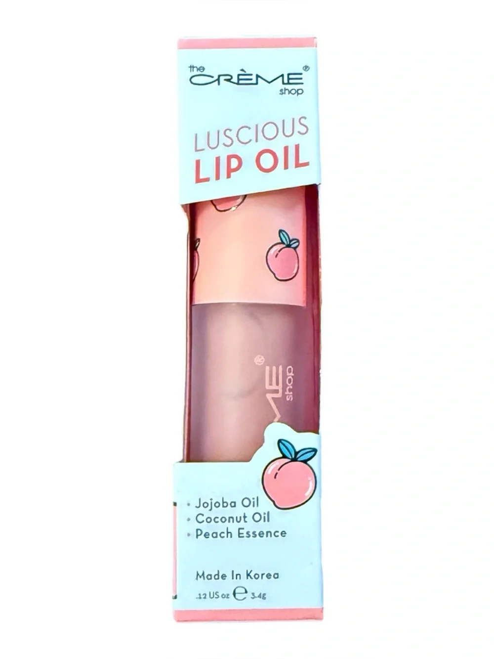 The Creme Shop Moisturizing Lip Oil in Peach Cobbler